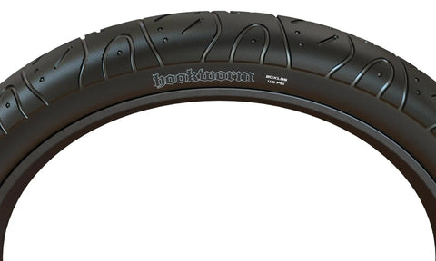 Close-up of Hookworm 24x2.50 BMX Cruiser Trail Tire showing tread pattern, built tough as nails for urban streets and park sessions.