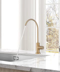 Top Shelf Champagne Bronze Kitchen Water Filter Faucet Built To Drop Right Into Most Reverse Osmosis Systems drawing crisp water in modern kitchen.