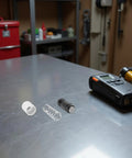 Floor Jack Replacement Parts Kit With Springs Pro Grade For Hydraulic Pump Piston Plunger Repair Made From Iron And Rubber Materials For Vehicle Maintenance In Automotive Garage For Tough Garage Use And Long Lasting Performance. parts on workbench