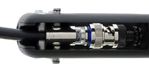 OmniSeal Pro XL Coax Compression Tool for F BNC RCA RG11F and MiniCoax Connectors, close-up of connector insertion