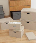 Heavy Duty Fabric Storage Bins With Snap On Lids Stackable Khaki Storage Boxes displayed in a tidy arrangement on a wooden floor.