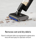 WashG1 Wet Cleaner cleaning tabletop, dual motorized rollers lifting wet and dry debris, matte black and ultra blue finish