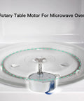 Rotary table motor positioned in a microwave oven setting