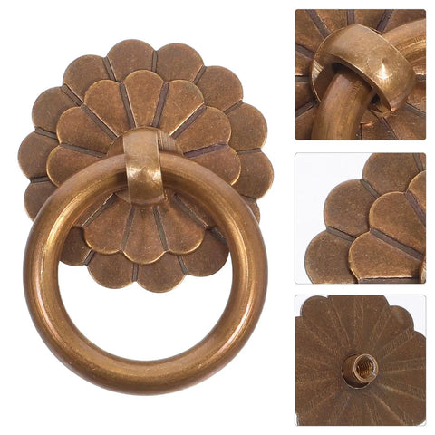 Close-up of a vintage brass ring pull handle from a Six Piece Set Vintage Brass Ring Pull Handles For Cabinets And Drawers Retro Bronze Hardware With Screws