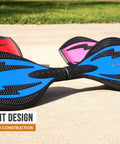 RipStik Ripster Caster Board For Narrow Stance Riders 9 Inch Blue With 360 Degree Trucks Concave Deck resting on pavement