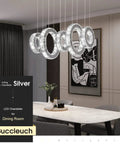 Five Ring Crystal Chandelier Pendant Light With Height Adjustable Stainless Steel Frame Dope K9 Crystals UL Certified Dimmable LED 6000K 4400lm For Dining Room Living Room Bedroom over a dining table