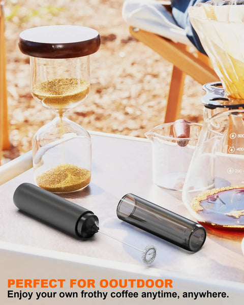 Rechargeable Milk Frother Wand With Cover Electric Drink Mixer With Stainless Steel Whisk on outdoor table