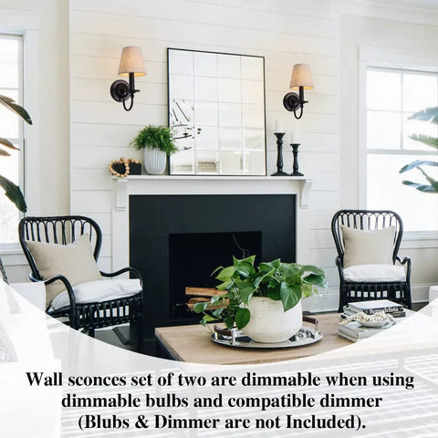 Black Wall Sconces Set Of Two With Linen Fabric Lampshades next to mirror on white wall above fireplace in living room