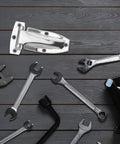 Beefy Heavy Duty Stainless Steel Hinges For Box Trucks Rear Doors And Cargo Containers with tools on wood surface