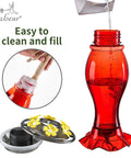 Outdoor Hummingbird Feeder 18 Oz With 6 Bee Guard Ports Built In Ant Moat Easy To Clean Durable Unbreakable Material showing cleaning process