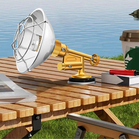 Portable Gas Camping Heater For Tent Garage And Workshop Reliable Outdoor Heat on a wooden picnic table by the lake.
