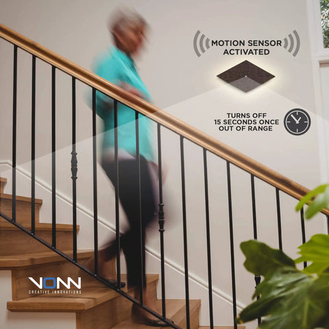 ADA Compliant Wall Sconce Lighting Fixture With Motion Sensor And Integrated LED in use in a staircase setting
