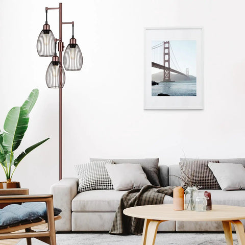 Living room with Dimmable Farmhouse Industrial Floor Lamp With Teardrop Cage Head, 70 Inch, Brown Finish next to a white sofa.