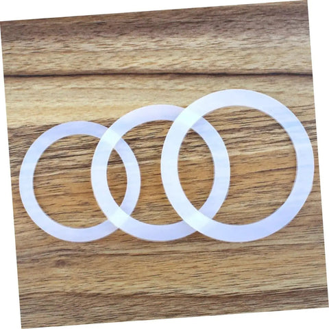 5 Pack Silicone Sealing Rings Replacement Gaskets For Coffee Pot Lids Espresso Pots And Canning Jars on wooden surface