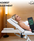 OmySalon Pro Electric Lift Massage Table With Dual Motors For Facial Beauty Salon Spa Therapy showing remote control for backrest adjustment.