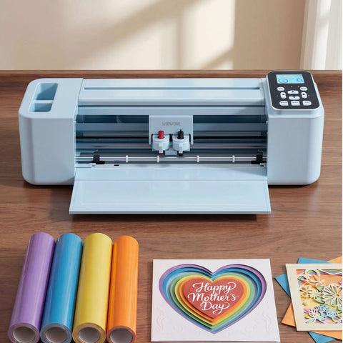 Level Up Your Side Hustle With This Slick 12 Inch Vinyl Cutting Machine on a wooden table with colored vinyl rolls and cards.