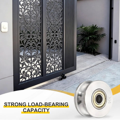 Top Shelf 304 Stainless Steel U Groove Pulley Wheel 10mm Bore 48mm OD attached to ornate gate for smooth cable operation.
