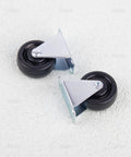 Heavy Duty 1.5 Inch Rubber Caster Wheels 4 Pack Fixed Rigid Non Swivel Casters For Furniture Rolls Like Butter Black close-up with metal top plate