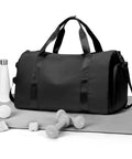 Black Gym Travel Duffle Bag For Women And Men, Lightweight Carry On Size 18x14x8, with water bottle, towel, and dumbbells.