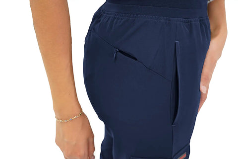 Side view of Women's Slim Fit Jogger Scrub Pants With Elastic Yoga Waistband showcasing deep side pocket for phones.