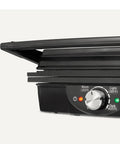 Amazon Basics Panini Press And Electric Indoor Grill With Adjustable Temp Settings Non Stick Ceramic Plates Black showing temperature dial and open lid.