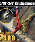Two Pack 5/16 To 3/8 Inch Ratchet Load Binders And 5/16 Inch G70 Transport Chains With Grappling Hooks, 10 Foot Heavy Duty Tie Down Set For Hauling Heavy Loads On Trucks And Flatbeds, 4,700 Lbs Working Load Limit. Image of a red ratchet binder attached to heavy machinery with a chain.