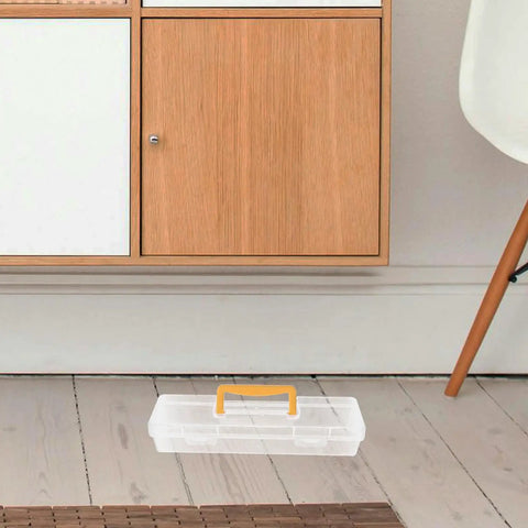 Straight Up Plastic Tool Box With Sturdy Carry Handle Divided Multi Purpose Compartments For Weekend DIY Projects Hardware Sorting Paint Brush Holder And Small Gear on wooden floor near furniture.