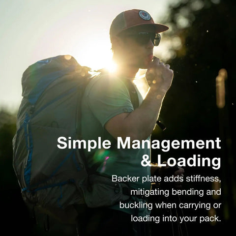 Hiker using 3L Hydration Reservoir For Backpacks With Bite Valve, BPA Free Leakproof Hydration Bladder, QuickConnect And Slide Seal.