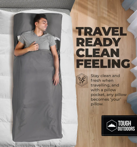 Person sleeping in Ultra Lightweight Sleeping Bag Liner For Adults Travel Sleep Sack And Hotel Sheets Keeps Your Gear Clean