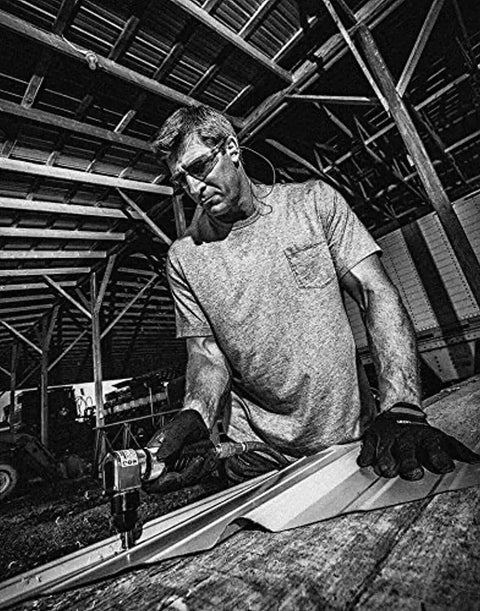 Person using Air Nibbler With Angled Head 4200 SPM Front Exhaust Cuts Up To 18 Gauge Steel Aluminum Or Plastic in workshop.