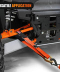 Beefy 4 Pack Axle Tie Down Straps 2 Inch by 38 Inch With Protective Sleeve and D Ring, Road Ready Heavy Duty Kit For Trailers, Trucks, UTVs, And Car Hoists, 11127 Lbs Break Strength, 3709 Lbs Working Load orange strap secured to UTV axle