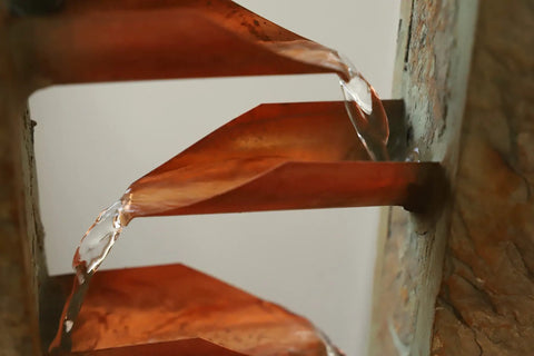 Close-up of copper water feature on Spillway Rustic Indoor Tabletop Water Fountain With Slate And Copper Finish Chill Vibe For Living Room Decor Quiet Motor With Easy Toggle 19 Inch Tall By 10 Inch Wide By 6 Inch Deep