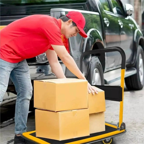Heavy Duty Folding Hand Truck Dolly With Wheels 330 Lb Capacity No Sweat Easy Move Trolley For Home Warehouse And Office Portable Telescoping Handle For Quick Transport, man loading boxes