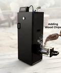 Smooth Operator Vertical Electric Smoker 1600W with chrome racks, adding wood chips for flavor, digital display visible.