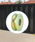 Heavy Duty 4 Inch V Groove Wheel With Double Bearings For Silky Smooth Gate Sliding Built Like A Rock With Zinc Galvanized Finish visible on gate