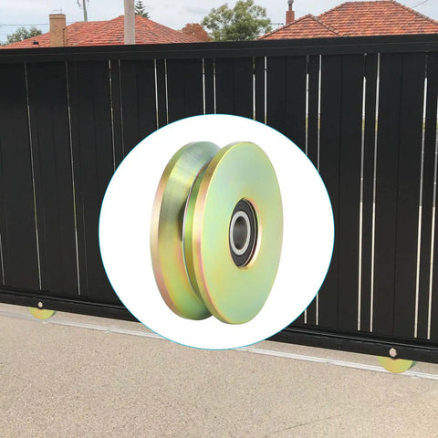 Heavy Duty 4 Inch V Groove Wheel With Double Bearings For Silky Smooth Gate Sliding Built Like A Rock With Zinc Galvanized Finish visible on gate