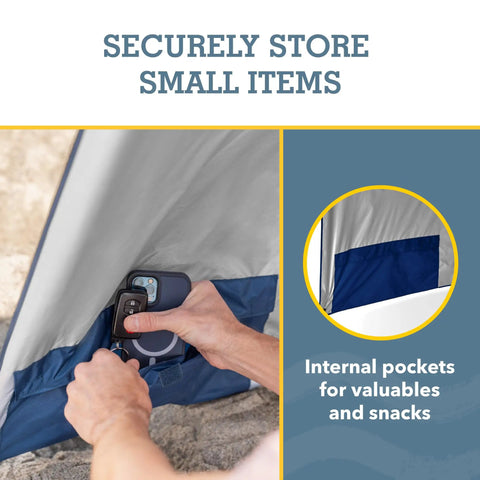 Internal pocket of Blue 8 Foot Canopy Shelter With UPF 50 Plus Sun And Rain Protection Two Patented Side Panels For Privacy displaying secure storage for small items.