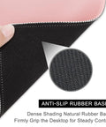 Close-up of pink square mouse pad 10.2 x 8.3 inches, showing anti-slip rubber base and stitched edge suitable for gaming and office use.