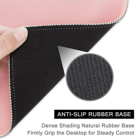 Close-up of pink square mouse pad 10.2 x 8.3 inches, showing anti-slip rubber base and stitched edge suitable for gaming and office use.