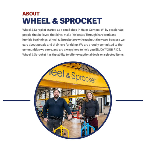 Wheel & Sprocket store interior with two staff holding bicycles