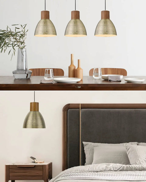 Hammered Pendant Lights For Kitchen Island 7 Inch Solid Wood Vintage Metal Hanging Light Fixture Adjustable Height Antique Gold Pendant Lamp Brushed Brass For That Farmhouse Vibe Dining Room 3 Pack above a dining table and beside a bed in a cozy setting.