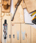 Compact Pneumatic Air Pencil Die Grinder With Heavy Duty Steel Build For Precision Engraving And Polishing Tasks on a wooden workbench