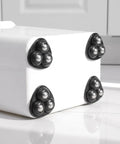 Mini Caster Wheels 12pcs 360 Degree Swivel Adhesive for Furniture black triangle casters with silver balls on a white storage box.