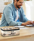 Desert Cowboys Insulated Lunch Bag With Leakproof Cooling on table with person using laptop