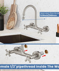 Wall Mount Kitchen Faucet With Sprayer And 360 Degree Swivel Spout Double Cross Handles Commercial Grade 8 Inch Center Brushed Nickel Finish Solid Brass Construction Heavy Duty Kitchen Sink Mixer Tap installed above a kitchen sink with visible wall mount features.