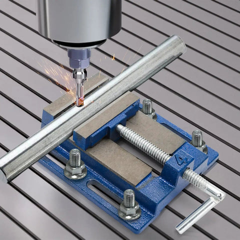 Drill Press Vise For Real World Makers, 4 Inch Jaw Opening Machinist Vise gripping metal pipe for drilling on workbench.