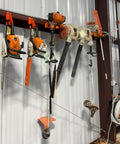 3 In 1 Chainsaw Holder Wall Mount Heavy Duty 10 Inch Steel Rack With Vertical Or Horizontal Storage 180 Lbs Capacity Built In Accessory Holes For File Wrench And Screwdriver Garage Organizer For Chainsaw Tools holding various tools