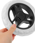 Close-up of 6.69 inch replacement laundry cart wheel with black ABS core and white PU tread, designed for durable rolling and easy maneuverability.