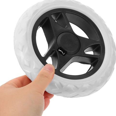 Close-up of 6.69 inch replacement laundry cart wheel with black ABS core and white PU tread, designed for durable rolling and easy maneuverability.