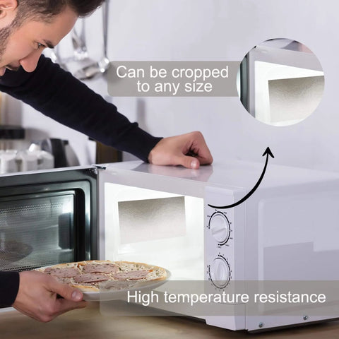 Man using 10 Piece Microwave Waveguide Cover Set With 5.9 By 4.7 Inches Mica Sheets as easy-cut replacement for heat insulation.
